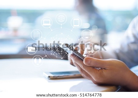 Man using mobile payments, holding circle global and icon customer network connection, Omni Channel