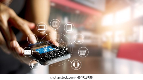 Man using mobile payments online shopping and icon customer network connection on screen, m-banking and omni channel 