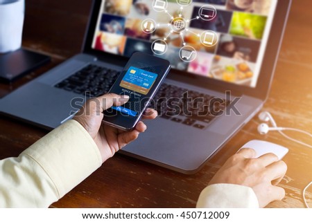
Man using mobile payments online shopping and icon customer network connection on screen, m-banking and omni channel 