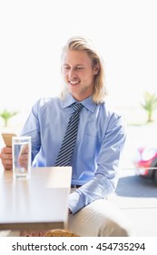 Man using mobile phone in restaurant