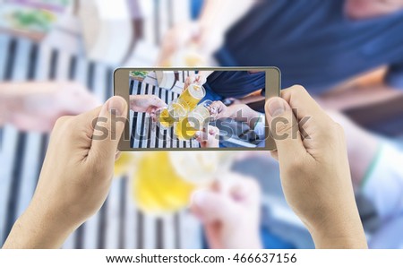 Similar – Image, Stock Photo Young hands taking photos with smartphones to vegetable skewers