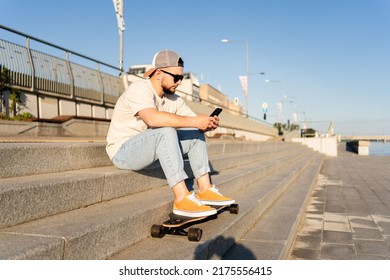 Man Using Mobile Phone While Sitting Stock Photo 2175556415 | Shutterstock