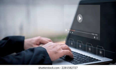 Man using mouse and keyboard for streaming online on virtual screen, watching video on internet, live concert, show or tutorial, content online.