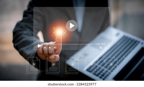 Man using mouse and keyboard for streaming online on virtual screen, watching video on internet, live concert, show or tutorial, content online.