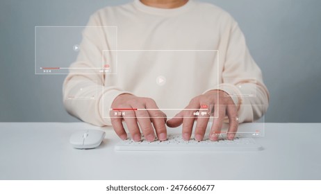A man using mouse and keyboard for streaming online, watching video on internet, live concert, show or tutorial, live streaming video on internet, digital multimedia player concept.
