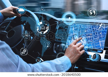 Man using navigation system while driving car, closeup