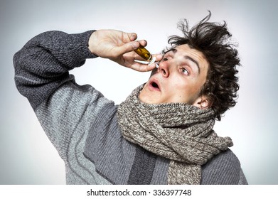 Man Using Nose Spray / Medication Or Drugs Abuse, Healthcare Concept 