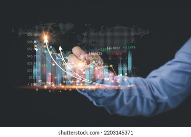 A man using a pen touching on growth graph virtual screen on hand to analyze for an investment of corporate. Business, and Finance concept. Analysis, strategy, and planning for business profit goals.