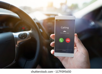 Man Using Phone Calling System In Car. Hand-free Safety Driving.