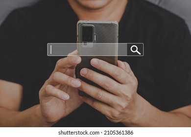 Man Using Phone Searching Browsing Internet Data Information With Search Bar Icon. Networking Concept