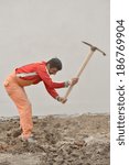 Man using sledge-hammer 