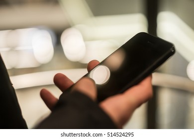 Man using smart phone close up. Mobile phone in male hand