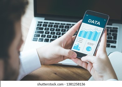 MAN USING A SMART PHONE DATA CONCEPT