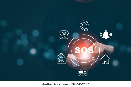 Man using Smart Phone with Emergency app in home, call phone, Chat message icon, Emergency application from smartphone for elderly, technology concept.Old hand touch mobile phone and call for help. - Powered by Shutterstock