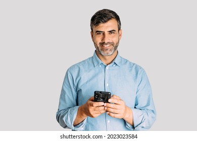 Man Using Smart Phone And Looking At Camera On White Background