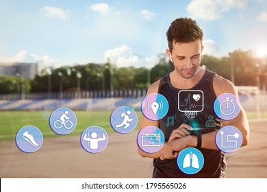 Man using smart watch during training outdoors. Icons near hand with device - Powered by Shutterstock