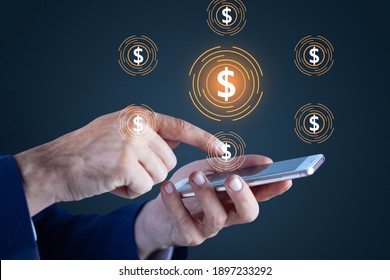 Man using smartphone with Dollar icon in virtual screen