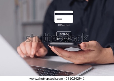 Man using smartphone and laptop for secure online payment. Digital interface shows credit card details and pay now button. E-commerce concept featuring safe transaction and financial checkout.
