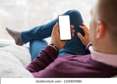 Man using smartphone. Mobile phone screen mockup. - Shutterstock ID 1105859084