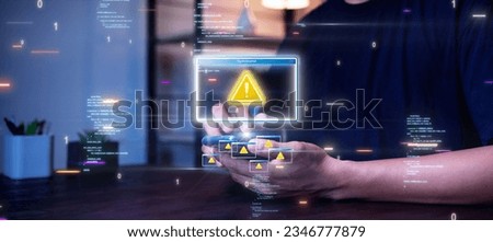 Man using smartphone with online crime risk warning symbol sign. Accessing websites, clicking on unsafe text links is a threat to identity theft software.