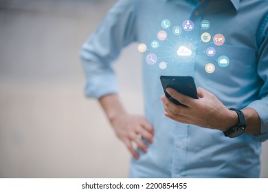 Man using smartphone showing cloud computing diagram in hand cloud technology data storage network and internet service concept