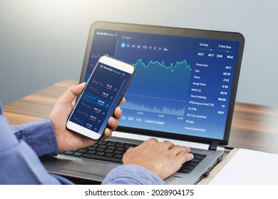 Man Using Smartphone Trading Online, Man Investment In Stock Exchange Trade