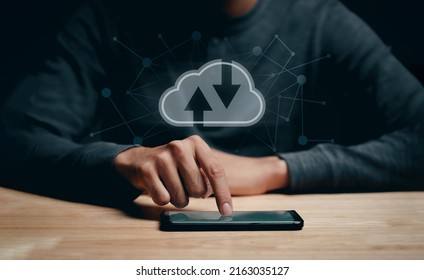 Man using smartphone with virtual cloud computing with connection line.Cloud computing system for sharing download and upload big data information.