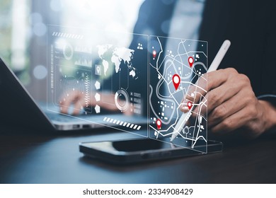 Man using Smartphone with virtual world and model map with location point, GPS app, icon Travel maps and find places in the online system, all screen graphics are generated, Searching for travel. - Shutterstock ID 2334908429