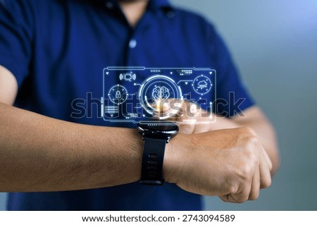 Man using smartwatch with digital brain interface hologram, representing artificial intelligence, health data monitoring, and wearable medical technology innovation.