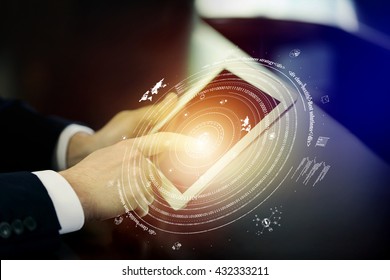 Man Using Tablet Against High Tech Background