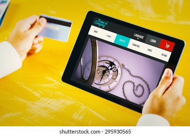 Man using tablet against website design