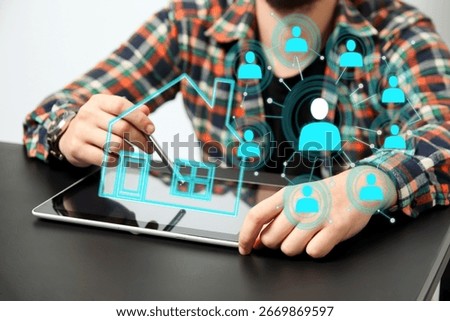 a man using a tablet to analyze digital data for a real estate solution. real estate agent tablet house digital. future of real estate technology concept