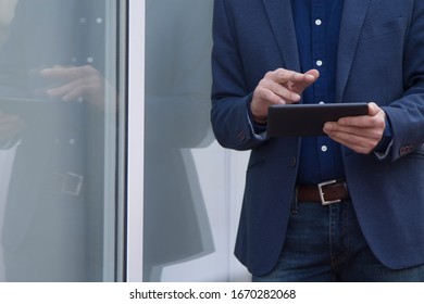 man using tablet close up view