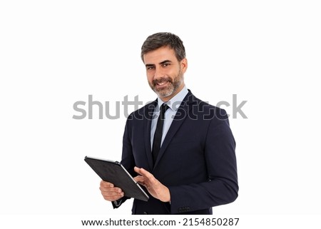 Man using tablet and looking at camera on white background