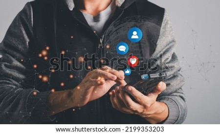 man using tablet PC with social media icon set,Young man touch cloud computing icon network. Cloud technology, Cloud data transfer.