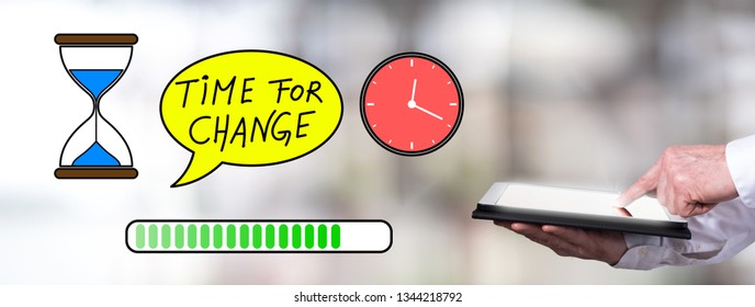 Man using a tablet with time for change concept