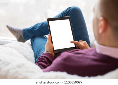 Man using tablet. Tablet vertical screen mockup.