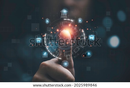 Man using thumb to scan finger print or for digital processing  biometric identification  to access  security system includes internet banking, cloud system and mobile phone , Cyber security concept.