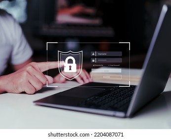 Man using  typing laptop login and password on virtual screen. Concept of security data internet access, cybersecurity on computer, protect data username and password.