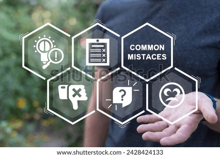 Man using virtual interface sees inscription: COMMON MISTAKES. Common Mistakes Business Education concept.