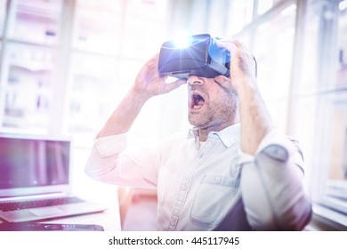 Man using a virtual reality device in the office
