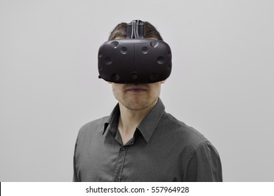 Man using virtual reality glasses. Close view, front.