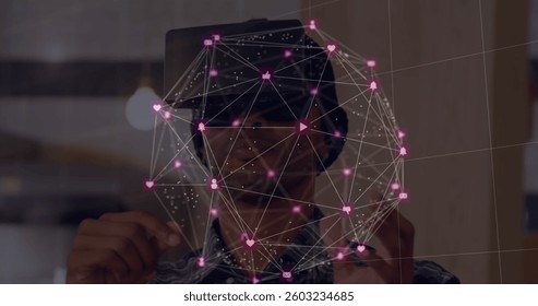 Man using virtual reality headset interacting with digital network interface. Technology, innovation, simulation, immersive, interactive, futuristic