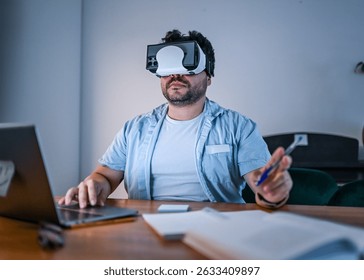 Man Using Virtual Reality Headset While Working Indoors with Bright Lighting Highlighting Technology's Role in Daily Tasks