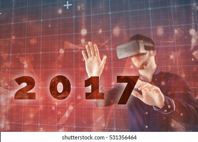 Man using virtual reality simulator against abstract background