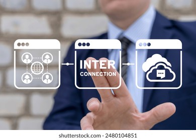 Man using virtual screen clicks text: INTERCONNECTION. Interconnected digital cyber era technology. Social networking interconnection communication concept. Big data and city interconnection tech.