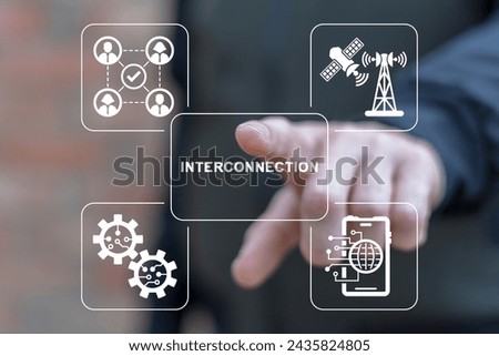 Man using virtual screen clicks word: INTERCONNECTION. Interconnected digital cyber era technology. Social networking interconnection communication concept. Big data and city interconnection tech.