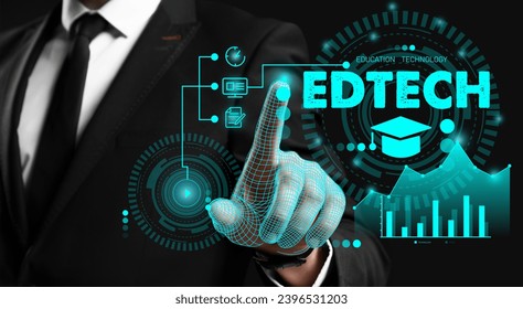 Man using virtual screen with text EDTECH on dark background