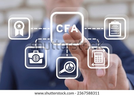 Man using virtual touch interface presses acronym: CFA. CFA Chartered Financial Analyst business concept. Program is a postgraduate professional certification.