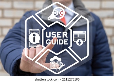 Man using virtual touch screen clicks a user guide inscription. User Manual Guide Business Service Communication Internet Technology Concept. - Shutterstock ID 2111273195